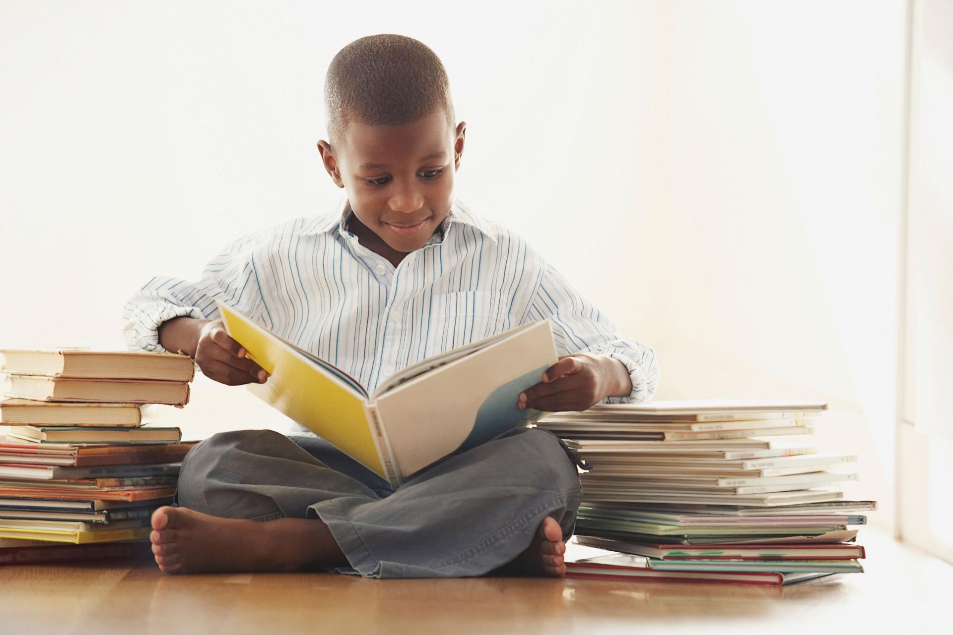 A young child reading a book