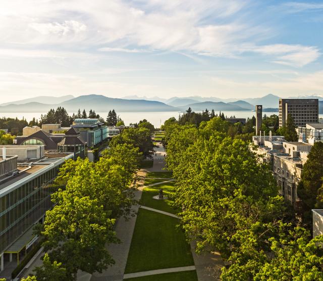 This picture shows the Main Mall at the UBC Vancouver campus looking out towards the Burrard Inlet. 