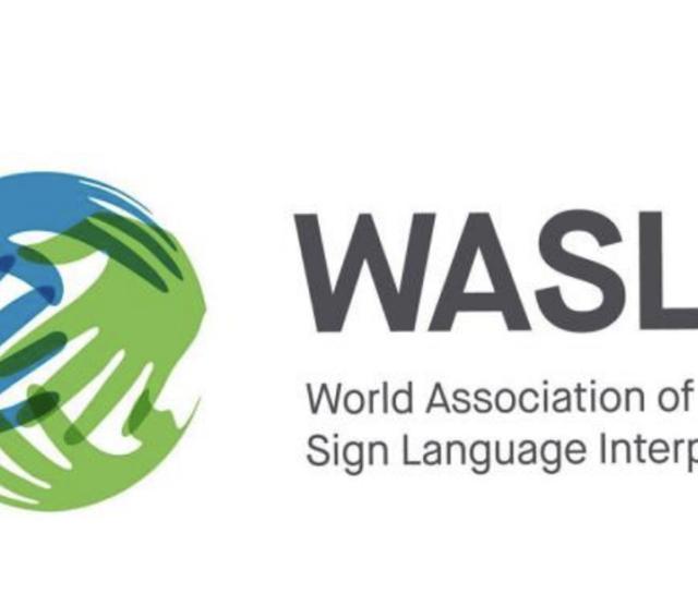 An illustration of blue and green hands touching in a globe