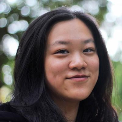 A headshot of Anja-Xiaoxing Cui standing outside