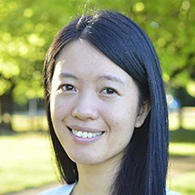 A headshot of Kristina Chang standing outside