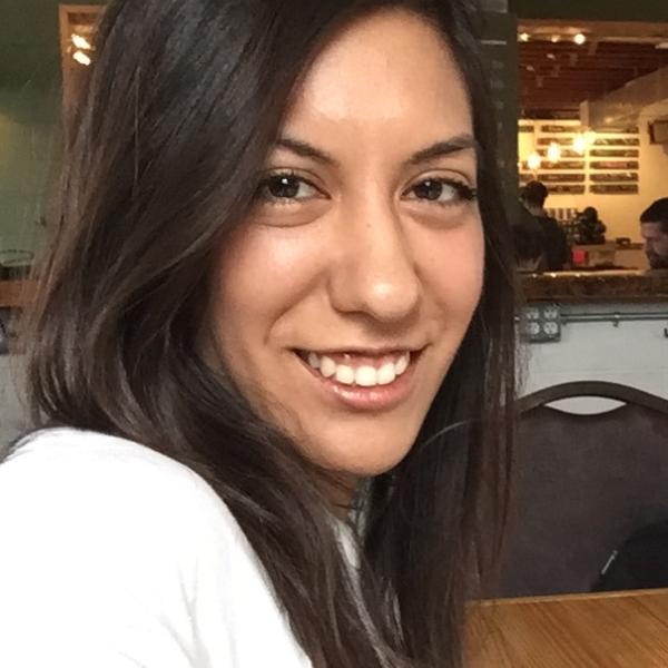 A headshot of Dr. Maria Arredondo smiling