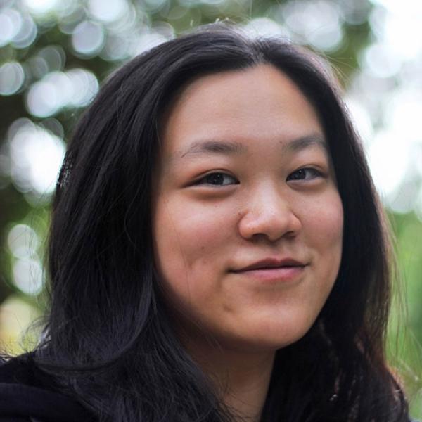 A headshot of Anja-Xiaoxing Cui standing outside