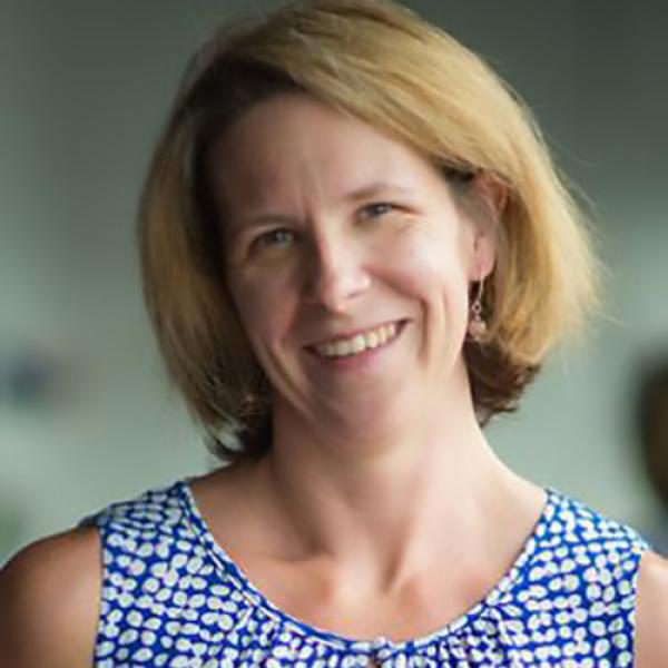 A headshot of Heather Bliss smiling